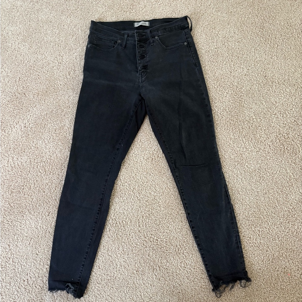 Madewell 9” high rise skinny jeans with a button fly.